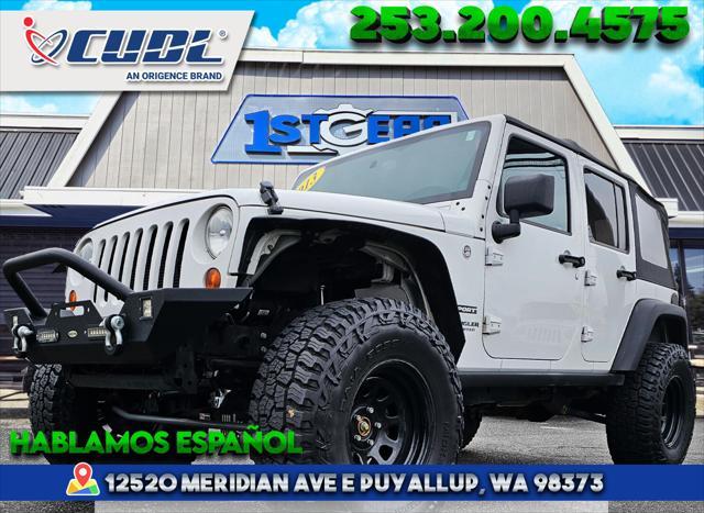 used 2013 Jeep Wrangler Unlimited car, priced at $18,977