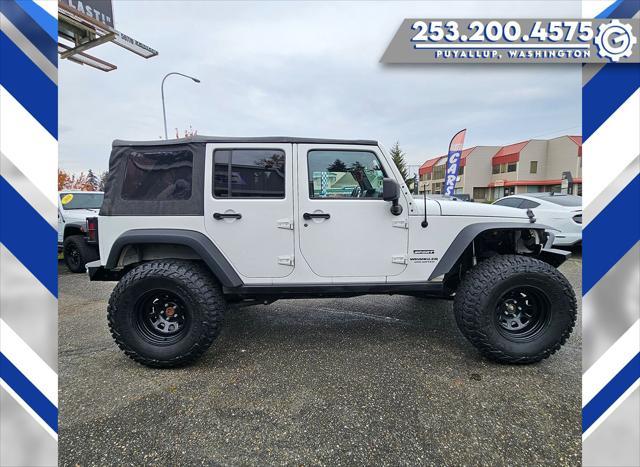 used 2013 Jeep Wrangler Unlimited car, priced at $18,977