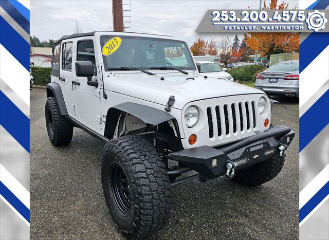 used 2013 Jeep Wrangler Unlimited car, priced at $18,977