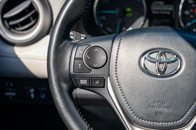 used 2018 Toyota RAV4 Hybrid car, priced at $21,677