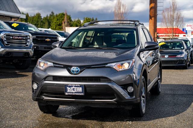 used 2018 Toyota RAV4 Hybrid car, priced at $21,677