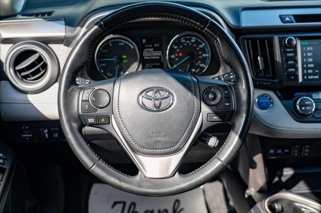 used 2018 Toyota RAV4 Hybrid car, priced at $21,677
