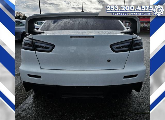 used 2014 Mitsubishi Lancer Evolution car, priced at $34,977