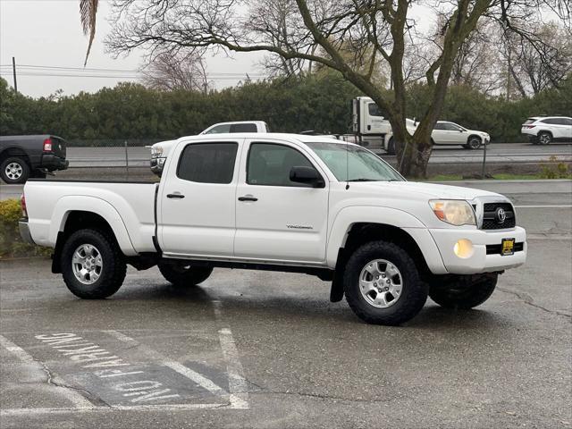 used 2011 Toyota Tacoma car, priced at $15,999