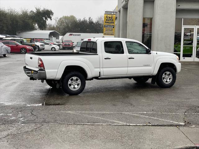 used 2011 Toyota Tacoma car, priced at $15,999