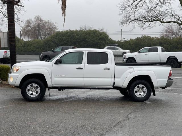 used 2011 Toyota Tacoma car, priced at $15,999