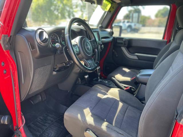 used 2012 Jeep Wrangler car, priced at $16,999