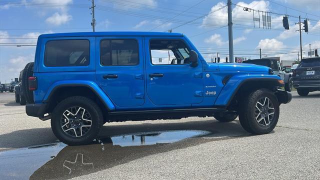 used 2024 Jeep Wrangler car, priced at $49,880