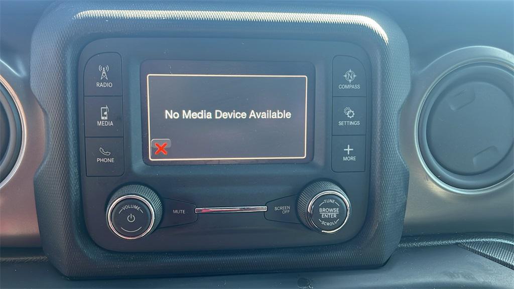 used 2021 Jeep Wrangler car, priced at $17,590
