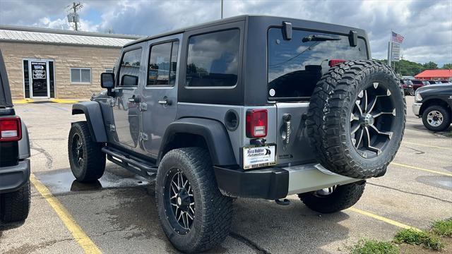 used 2013 Jeep Wrangler Unlimited car, priced at $14,790