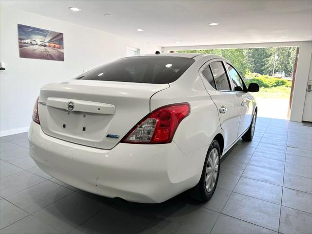 used 2014 Nissan Versa car, priced at $5,799
