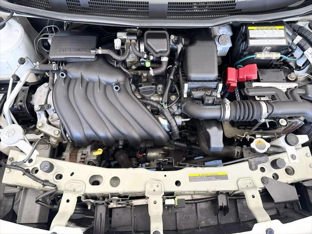 used 2014 Nissan Versa car, priced at $5,799
