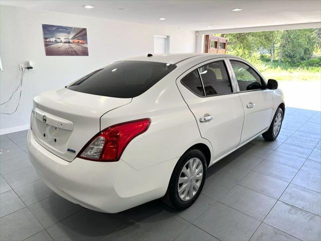 used 2014 Nissan Versa car, priced at $5,799