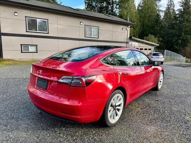 used 2023 Tesla Model 3 car, priced at $21,999