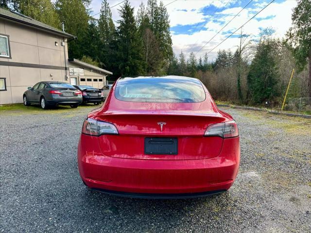 used 2023 Tesla Model 3 car, priced at $21,999