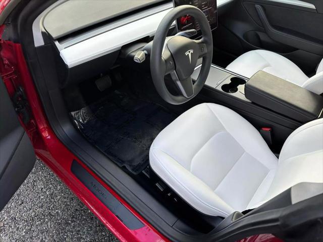 used 2023 Tesla Model 3 car, priced at $21,999