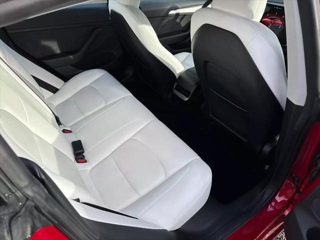 used 2023 Tesla Model 3 car, priced at $21,999