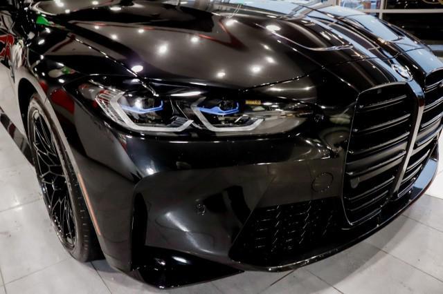 used 2022 BMW M4 car, priced at $62,500