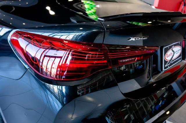 used 2025 BMW M4 car, priced at $84,488