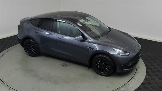 used 2022 Tesla Model Y car, priced at $32,400