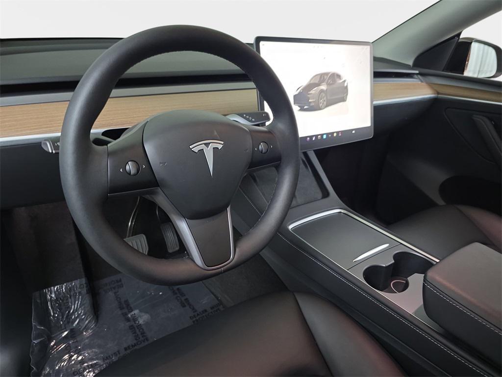 used 2025 Tesla Model Y car, priced at $39,292