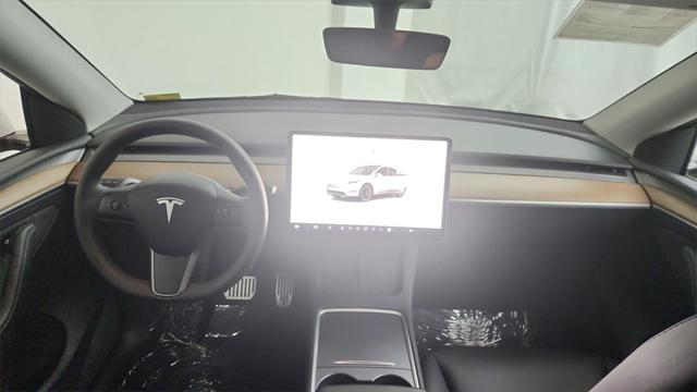 used 2023 Tesla Model Y car, priced at $31,850