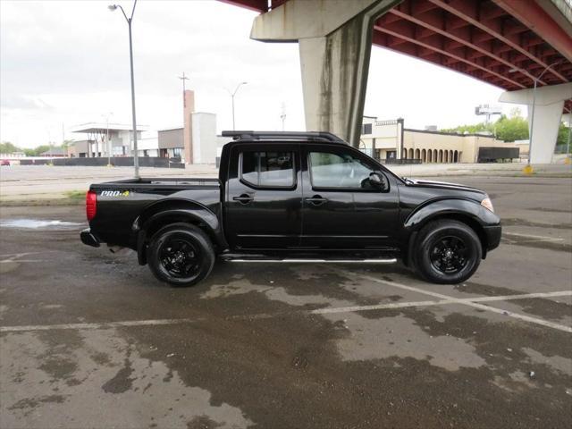 used 2013 Nissan Frontier car, priced at $21,999