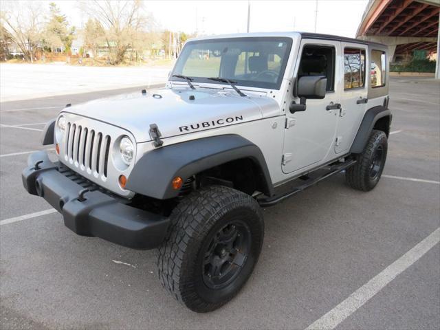 used 2010 Jeep Wrangler Unlimited car, priced at $15,990