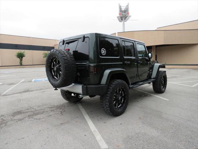 used 2011 Jeep Wrangler Unlimited car, priced at $18,990