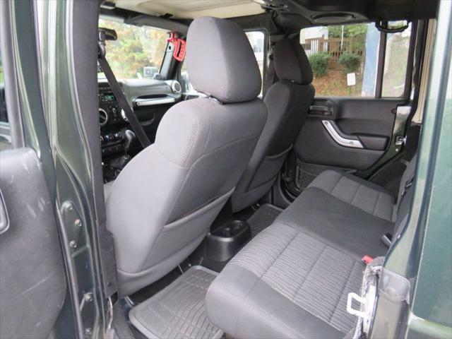 used 2011 Jeep Wrangler Unlimited car, priced at $18,990