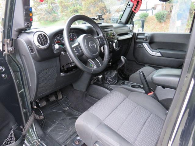 used 2011 Jeep Wrangler Unlimited car, priced at $18,990