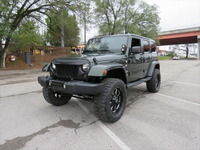 used 2011 Jeep Wrangler Unlimited car, priced at $18,990