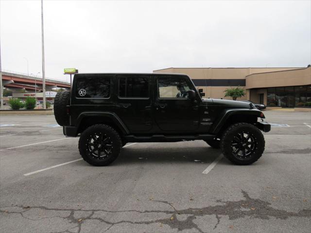 used 2011 Jeep Wrangler Unlimited car, priced at $18,990