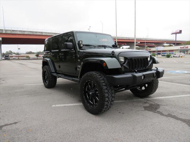 used 2011 Jeep Wrangler Unlimited car, priced at $18,990