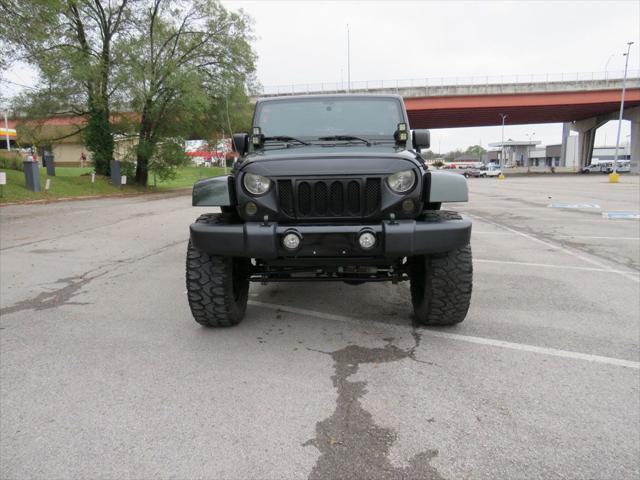 used 2011 Jeep Wrangler Unlimited car, priced at $18,990