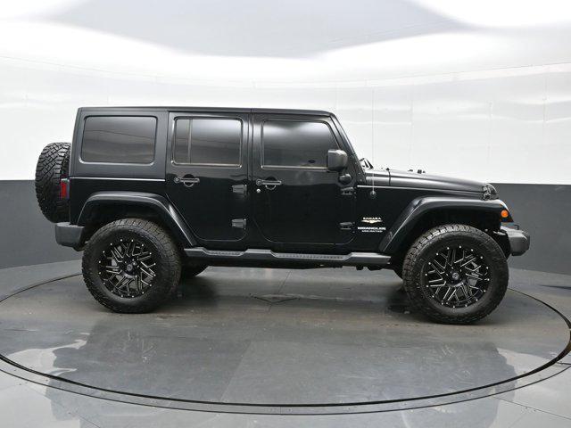 used 2015 Jeep Wrangler Unlimited car, priced at $17,490