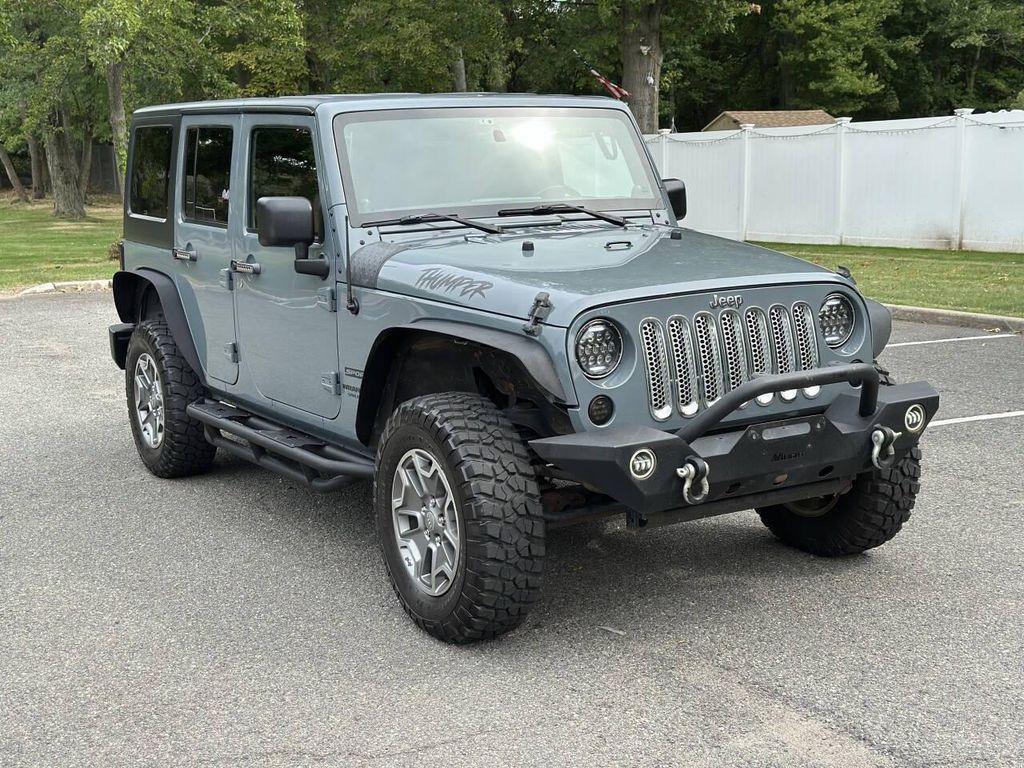 used 2014 Jeep Wrangler Unlimited car, priced at $10,995
