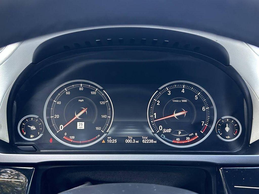 used 2015 BMW 750 car, priced at $14,995