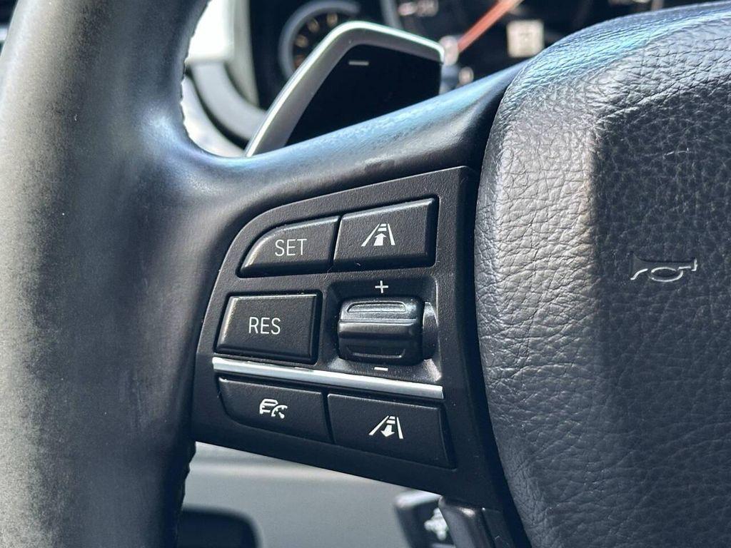 used 2015 BMW 750 car, priced at $14,995