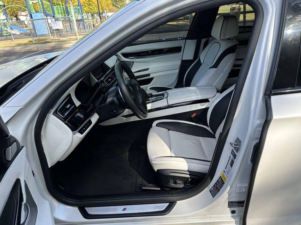 used 2015 BMW 750 car, priced at $14,995