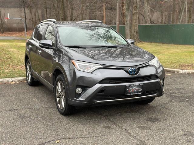 used 2018 Toyota RAV4 Hybrid car, priced at $15,995