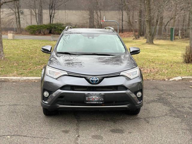 used 2018 Toyota RAV4 Hybrid car, priced at $15,995