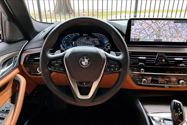 used 2023 BMW 530e car, priced at $37,980