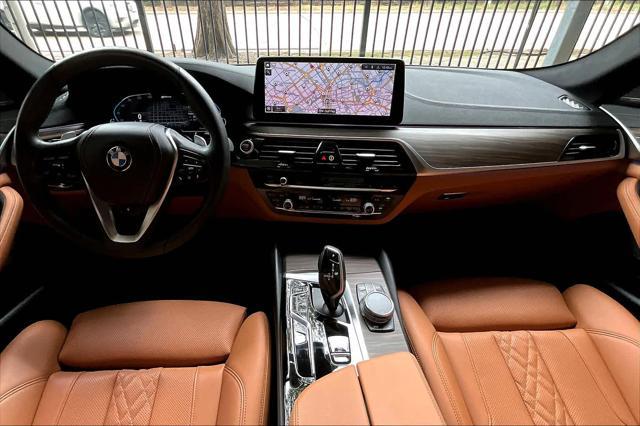 used 2023 BMW 530e car, priced at $37,980