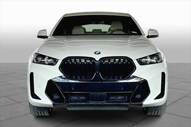 used 2024 BMW X6 car, priced at $70,473