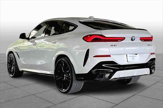 used 2024 BMW X6 car, priced at $70,473