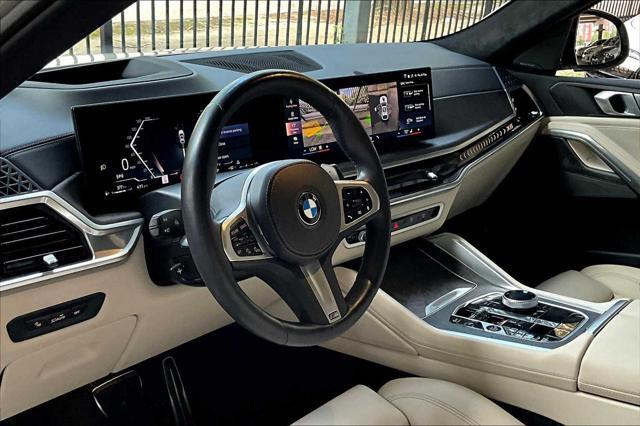 used 2024 BMW X6 car, priced at $70,473