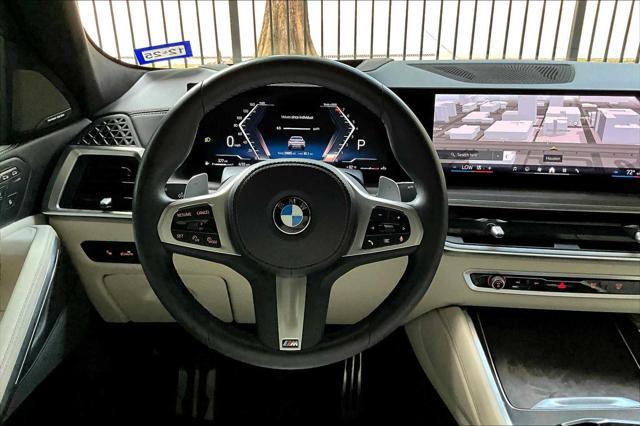 used 2024 BMW X6 car, priced at $70,473
