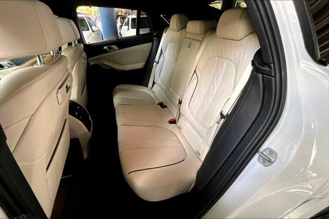 used 2024 BMW X6 car, priced at $70,473