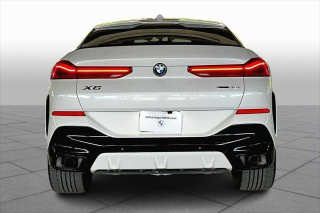 used 2024 BMW X6 car, priced at $70,473